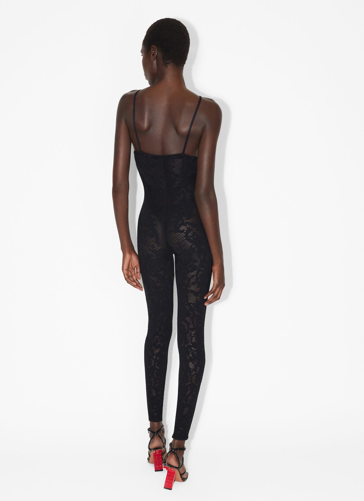 Laced jumpsuit ALAÏA BLACK LACED JUMPSUIT
